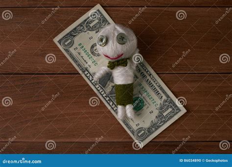 Money voidoo doll